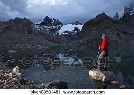 "Hikers at the mountain lake Lago de los Tres with the Fitz Roy massif, Los Glaciares National Park, El Chalten, Santa Cruz, Argentina, South America" View Large Photo Image Stock Image - "Hikers at the mountain lake Lago de los Tres with the Fitz Roy massif, Los Glaciares National Park, El Chalten, Santa Cruz, Argentina, South America". Fotosearch