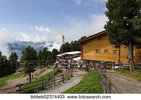 "Hikers at the Raschoetz top station, Chalet Raschoetz mountain cabin above St. Ulrich or Ortisei, Val Gardena valley or Groednertal valley, province of Bolzano-Bozen, Alto Adige, Italy, Europe" View Large Photo Image Stock Image - "Hikers at the Raschoetz top station, Chalet Raschoetz mountain cabin above St. Ulrich or Ortisei, Val Gardena valley or Groednertal valley, province of Bolzano-Bozen, Alto Adige, Italy, Europe". Fotosearch