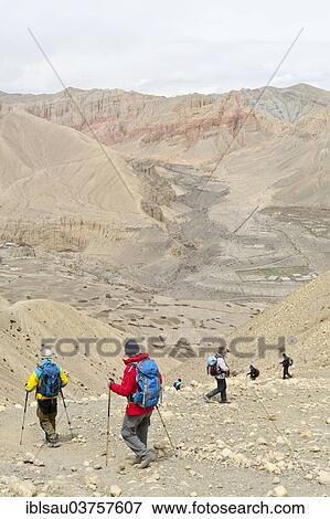 "Hikers descending from the Ghemi La Pass, Upper Mustang, Nepal, Asia" View Large Photo Image Stock Photo - "Hikers descending from the Ghemi La Pass, Upper Mustang, Nepal, Asia". Fotosearch