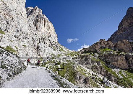 "Hikers during the ascent to Kesselkogel Mountain above the Rifugio Gardecia hut, Rosengarten Group and Rifugio Preuss hut at the rear, Trentino, Italy, Europe" View Large Photo Image Stock Photograph - "Hikers during the ascent to Kesselkogel Mountain above the Rifugio Gardecia hut, Rosengarten Group and Rifugio Preuss hut at the rear, Trentino, Italy, Europe". Fotosearch