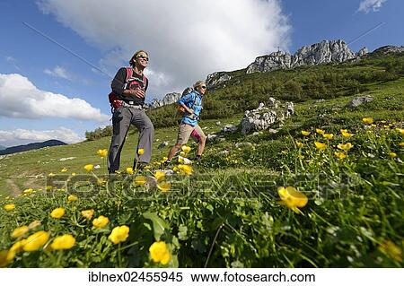 "Hikers in front of Kampenwand Mountain, Chiemgau, Bavaria, Germany, Europe" View Large Photo Image Stock Photography - "Hikers in front of Kampenwand Mountain, Chiemgau, Bavaria, Germany, Europe". Fotosearch