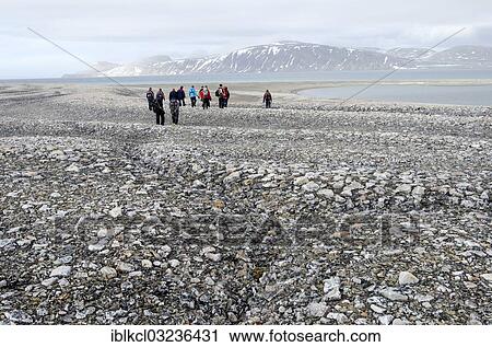 "Hikers in the Arctic eis desert, in the foreground frost cracks in the frost ground patterns, Zorgdragerfjorden, Prins Oscars Land, Nordaustlandet, Svalbard Archipelago, Svalbard and Jan Mayen, Norway, Europe" View Large Photo Image Stock Image - "Hikers in the Arctic eis desert, in the foreground frost cracks in the frost ground patterns, Zorgdragerfjorden, Prins Oscars Land, Nordaustlandet, Svalbard Archipelago, Svalbard and Jan Mayen, Norway, Europe". Fotosearch