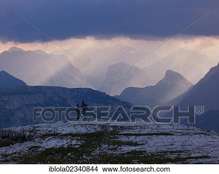 Picture - "Hikers in the Dolomiti di Sesto National Park, Sexten Dolomites, Hochpustertal, High Puster Valley, South Tyrol, Italy, Europe". Fotosearch