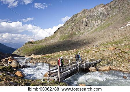 "Hikers in the Martell Valley with Martell Hut in the distance, Alpen, South Tyrol province, Trentino-Alto Adige, Italy, Europe" View Large Photo Image Stock Photo - "Hikers in the Martell Valley with Martell Hut in the distance, Alpen, South Tyrol province, Trentino-Alto Adige, Italy, Europe". Fotosearch