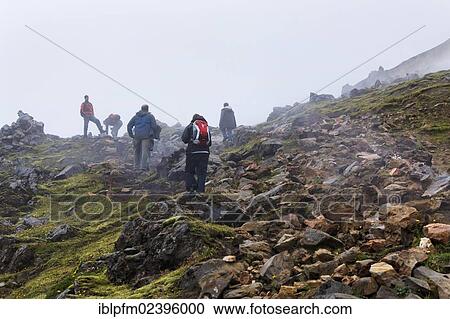 Stock Image - "Hikers in volcanic landscape, Landmannalaugar, Iceland, Europe". Fotosearch