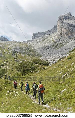 "Hikers on a trail, Brenta crossing at the Passo della Gaiarda, Mt Cima Gaiarda, Brenta Mountains, near Molveno, South Tyrol province, Trentino-Alto Adige, Italy, Europe" View Large Photo Image Stock Photography - "Hikers on a trail, Brenta crossing at the Passo della Gaiarda, Mt Cima Gaiarda, Brenta Mountains, near Molveno, South Tyrol province, Trentino-Alto Adige, Italy, Europe". Fotosearch