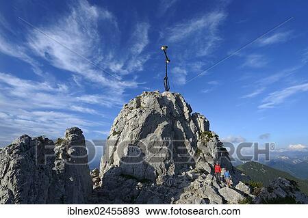 "Hikers on the summit of Kampenwand Mountain, Chiemgau, Bavaria, Germany, Europe" View Large Photo Image Stock Image - "Hikers on the summit of Kampenwand Mountain, Chiemgau, Bavaria, Germany, Europe". Fotosearch