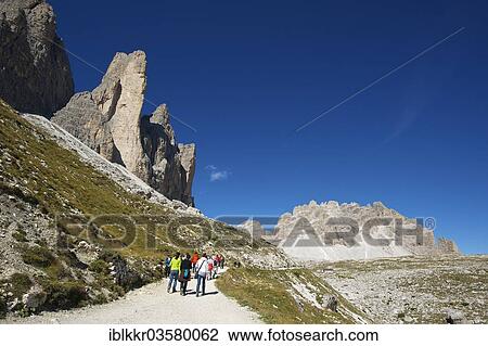 "Hikers on the trail to the Three Peaks, Sextner Dolomiten, South Tyrol province, Trentino-Alto Adige, Italy, Europe" View Large Photo Image Stock Image - "Hikers on the trail to the Three Peaks, Sextner Dolomiten, South Tyrol province, Trentino-Alto Adige, Italy, Europe". Fotosearch