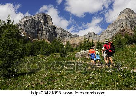 "Hikers rambling in the Rocky Mountains, Banff National Park, Alberta Province, Canada, North America" View Large Photo Image Stock Photo - "Hikers rambling in the Rocky Mountains, Banff National Park, Alberta Province, Canada, North America". Fotosearch