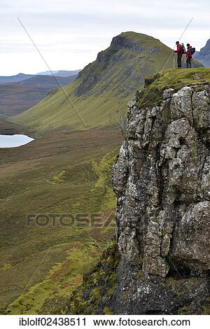 "Hikers standing in the volcanic landscape, Flodigarry, Isle of Skye, Scotland, United Kingdom, Europe" View Large Photo Image Stock Image - "Hikers standing in the volcanic landscape, Flodigarry, Isle of Skye, Scotland, United Kingdom, Europe". Fotosearch