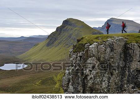 "Hikers standing in the volcanic landscape, Flodigarry, Isle of Skye, Scotland, United Kingdom, Europe" View Large Photo Image Stock Image - "Hikers standing in the volcanic landscape, Flodigarry, Isle of Skye, Scotland, United Kingdom, Europe". Fotosearch