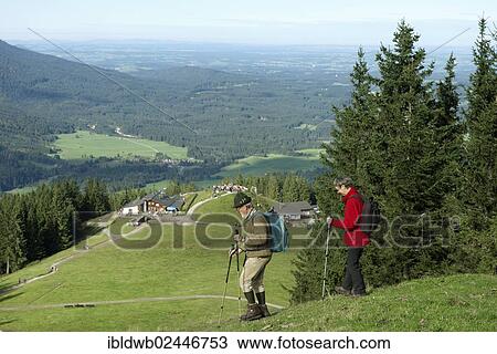 "Hikers walking on a path from Mittleres Hoernle mountain to Lechrain, passing Hoernlehuette mountain cabin, Ammergau Alps, Upper Bavaria, Bavaria, Germany, Europe" View Large Photo Image Stock Image - "Hikers walking on a path from Mittleres Hoernle mountain to Lechrain, passing Hoernlehuette mountain cabin, Ammergau Alps, Upper Bavaria, Bavaria, Germany, Europe". Fotosearch