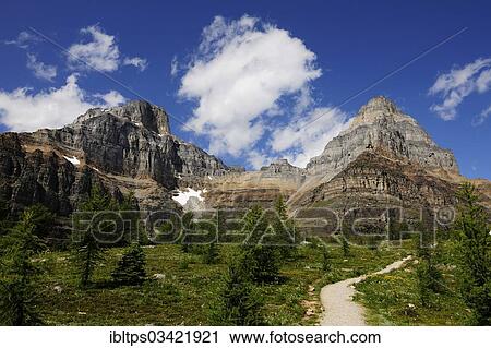 Stock Image - "Hiking trail in the Rocky Mountains, Banff National Park, Alberta Province, Canada, North America". Fotosearch