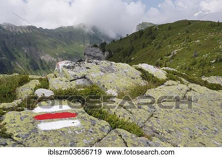 Stock Photo - "Hiking trail, looking towards the Sieben Hengste mountains, Bernese Oberland, Switzerland, Europe". Fotosearch