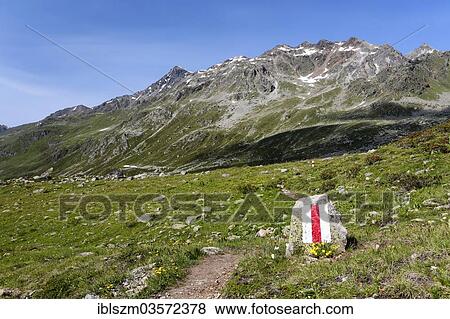 Stock Photo - "Hiking trail sign in Getschtalli, Dischma Valley, Davos, Graubunden, Switzerland, Europe". Fotosearch