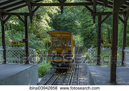 "Hill station, Nerobergbahn historic rack funicular from 1888 on the viaduct, Neroberg, Wiesbaden, Hesse, Germany, Europe" View Large Photo Image Stock Photo - "Hill station, Nerobergbahn historic rack funicular from 1888 on the viaduct, Neroberg, Wiesbaden, Hesse, Germany, Europe". Fotosearch