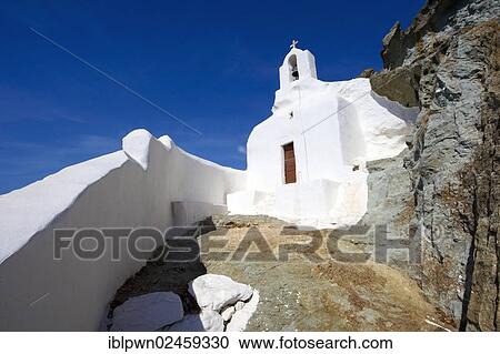 Stock Image - "Hill-top Orthodox cave church above Naxos Thira, Naxos Island, Cyclades Islands, Greece, Europe". Fotosearch