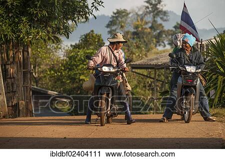 "Hill Tribe people, Lisu people, an ethnic minority, men on their motorcycles in a village, northern Thailand, Thailand, Asia" View Large Photo Image Stock Image - "Hill Tribe people, Lisu people, an ethnic minority, men on their motorcycles in a village, northern Thailand, Thailand, Asia". Fotosearch