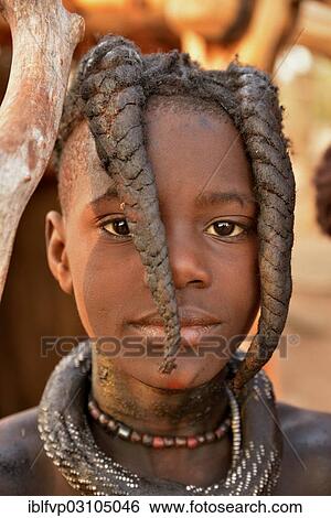 "Himba girl with typical hairstyle, Omuramba, Kaokoland, Kunene, Namibia, Africa" View Large Photo Image Stock Photograph - "Himba girl with typical hairstyle, Omuramba, Kaokoland, Kunene, Namibia, Africa". Fotosearch