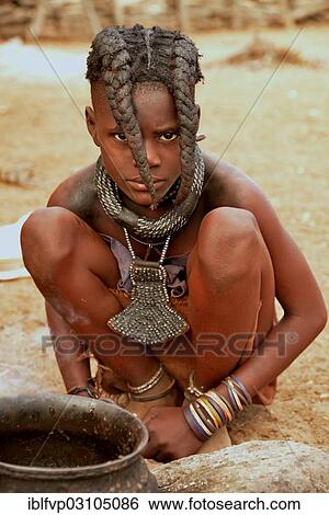 "Himba girl with typical hairstyle, Omuramba, Kaokoland, Kunene, Namibia, Africa" View Large Photo Image Stock Photograph - "Himba girl with typical hairstyle, Omuramba, Kaokoland, Kunene, Namibia, Africa". Fotosearch