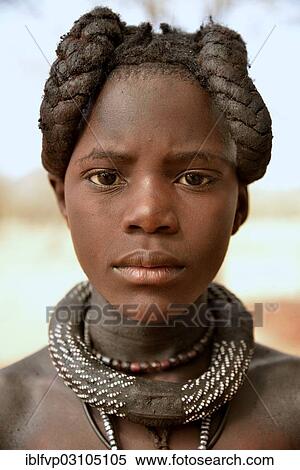 Stock Photography - "Himba girl with typical hairstyle, Omuramba, Kaokoland, Kunene, Namibia, Africa". Fotosearch