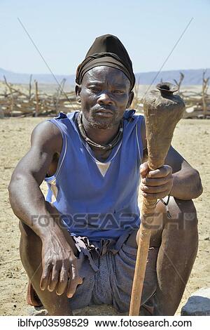 "Himba man, Purros Traditional Village, Purros, Kaokoland, Kunene, Namibia, Africa" View Large Photo Image Stock Photo - "Himba man, Purros Traditional Village, Purros, Kaokoland, Kunene, Namibia, Africa". Fotosearch
