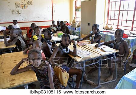 "Himba pupils sitting in a classroom at the Omohanga Primary School, Himba school, Omohanga, Kaokoland, Kunene, Namibia, Africa" View Large Photo Image Stock Photograph - "Himba pupils sitting in a classroom at the Omohanga Primary School, Himba school, Omohanga, Kaokoland, Kunene, Namibia, Africa". Fotosearch