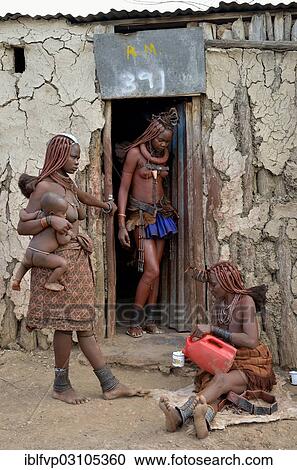 "Himba women in front of their hut, Otuzemba, Opuwo, Kaokoland, Kunene, Namibia, Africa" View Large Photo Image Stock Image - "Himba women in front of their hut, Otuzemba, Opuwo, Kaokoland, Kunene, Namibia, Africa". Fotosearch
