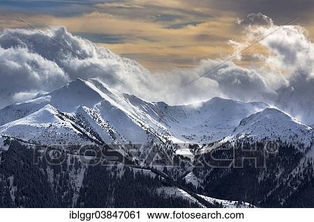 "Himmeleck mountain, on the left, and Himmelkogel mountain, on the right, in the Seckau Alps, Niedere Tauern mountain range, rain clouds approaching, seen from Blaseneckgipfel mountain in the Eisenerzer Alpen mountains, Styria, Austria, Europe" View Large Photo Image Stock Image - "Himmeleck mountain, on the left, and Himmelkogel mountain, on the right, in the Seckau Alps, Niedere Tauern mountain range, rain clouds approaching, seen from Blaseneckgipfel mountain in the Eisenerzer Alpen mountains, Styria, Austria, Europe". Fotosearch