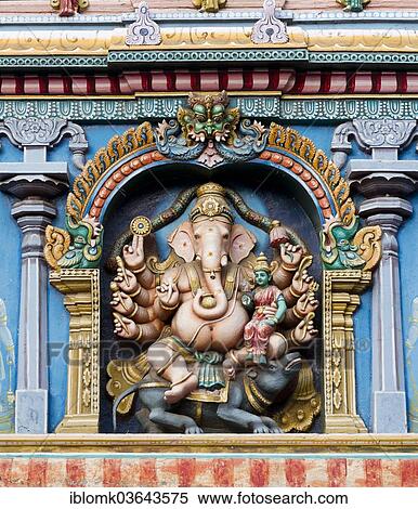 "Hindu god Ganesha or Ganpati, the elephant-headed god in a representation with ten arms on a temple wall, Meenakshi Amman Temple or Sri Meenakshi Sundareswarar Temple, Madurai, Tamil Nadu, India, Asia" View Large Photo Image Stock Photography - "Hindu god Ganesha or Ganpati, the elephant-headed god in a representation with ten arms on a temple wall, Meenakshi Amman Temple or Sri Meenakshi Sundareswarar Temple, Madurai, Tamil Nadu, India, Asia". Fotosearch