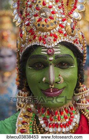 "Hindu temple dancer wearing gold jewelry with his face painted green, portrait, Varkala, Kerala, India, Asia" View Large Photo Image Stock Image - "Hindu temple dancer wearing gold jewelry with his face painted green, portrait, Varkala, Kerala, India, Asia". Fotosearch