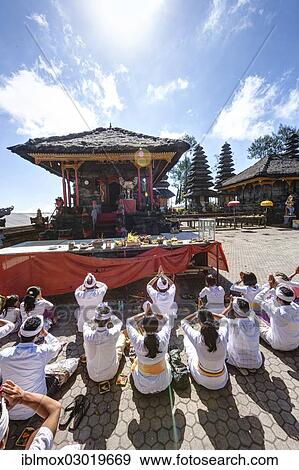 "Hindu worshippers praying at Pura Ulun Danu Batur Temple, Batur, Bali, Indonesia, Asia" View Large Photo Image Stock Photo - "Hindu worshippers praying at Pura Ulun Danu Batur Temple, Batur, Bali, Indonesia, Asia". Fotosearch