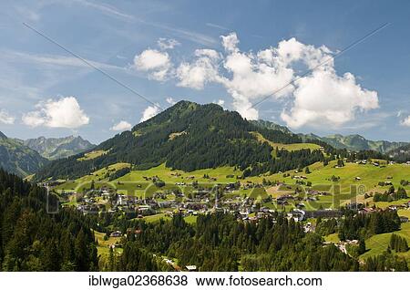 "Hirschegg, Kleinwalsertal valley, Heuberg mountain at the back, 1795m, Vorarlberg, Austria, Europe" View Large Photo Image Stock Photo - "Hirschegg, Kleinwalsertal valley, Heuberg mountain at the back, 1795m, Vorarlberg, Austria, Europe". Fotosearch