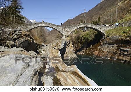 "Historic bridge Ponte dei Salti with double arches through the Verzasca River, Lavertezzo, Canton Ticino, Switzerland, Europe" View Large Photo Image Stock Image - "Historic bridge Ponte dei Salti with double arches through the Verzasca River, Lavertezzo, Canton Ticino, Switzerland, Europe". Fotosearch
