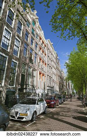 Stock Photo - "Historic buildings beside Keizersgracht canal in Amsterdam, Holland, The Netherlands, Europe". Fotosearch