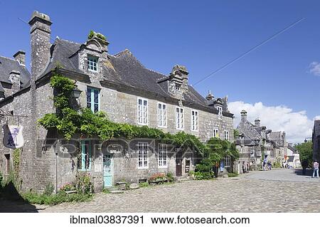 Stock Image - "Historic buildings in the market square of Locronan, Departement Finistere, Brittany, France, Europe". Fotosearch