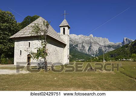 Stock Image - "Historic Catholic church in Theth National Park, Albanian Alps, Albania, The Balkans, Europe". Fotosearch