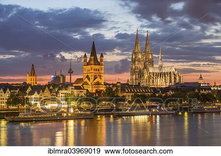 "Historic centre with Cathedral, Great St. Martin Church, Colonius, WDR building and City Hall, the Rhine at the front, dusk, Cologne, North Rhine-Westphalia, Germany, Europe" View Large Photo Image Stock Photo - "Historic centre with Cathedral, Great St. Martin Church, Colonius, WDR building and City Hall, the Rhine at the front, dusk, Cologne, North Rhine-Westphalia, Germany, Europe". Fotosearch