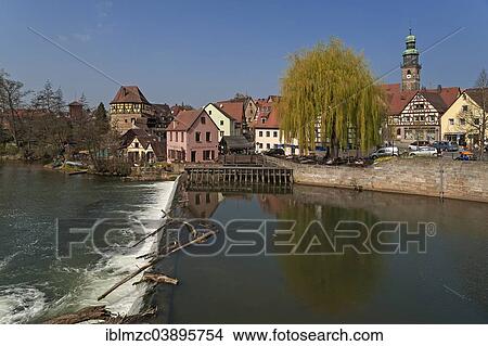 Picture - "Historic centre with the Schleifmuhle mill and Johanniskirche church, in front a weir of the Pegnitz, Lauf an der Pegnitz, Middle Franconia, Bavaria, Germany, Europe". Fotosearch