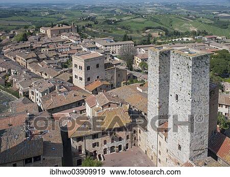 "Historic centre with the Torri dei Salvucci, twin towers or Torri Gemelli, view from the Torre Grossa tower in San Gimignano, Tuscany, Italy, Europe" View Large Photo Image Stock Photo - "Historic centre with the Torri dei Salvucci, twin towers or Torri Gemelli, view from the Torre Grossa tower in San Gimignano, Tuscany, Italy, Europe". Fotosearch