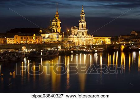 Stock Photo - "Historic district of Dresden with the Elbe river in the foreground at twilight, Dresden, Saxony, Germany, Europe". Fotosearch