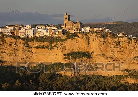 "Historic district with San Pedro church, on a limestone crack, in the evening light, White Town of Arcos de la Fronter, Cadiz province, Andalusia, Spain, Europe" View Large Photo Image Stock Photo - "Historic district with San Pedro church, on a limestone crack, in the evening light, White Town of Arcos de la Fronter, Cadiz province, Andalusia, Spain, Europe". Fotosearch