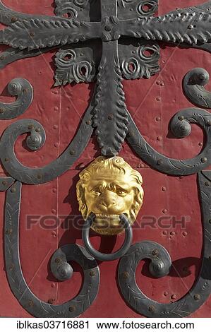 Stock Image - "Historic door with fittings and a lion head door knocker, Gorlitz, Saxony, Germany, Europe". Fotosearch