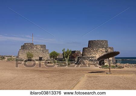 "Historic fortress complex on the beach promenade of Caleta de Fuste, Fuerteventura, Canary Islands, Spain, Europe" View Large Photo Image Stock Photograph - "Historic fortress complex on the beach promenade of Caleta de Fuste, Fuerteventura, Canary Islands, Spain, Europe". Fotosearch