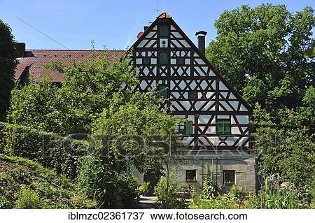 "Historic half-timbered Franconian house, Muehlgasse street, Schnaittach, Middle Franconia, Bavaria, Germany, Europe" View Large Photo Image Stock Photo - "Historic half-timbered Franconian house, Muehlgasse street, Schnaittach, Middle Franconia, Bavaria, Germany, Europe". Fotosearch