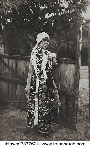 Picture - "Historic photograph, ca 1914-1918, wealthy Romanian woman in traditional costume, Romania, Europe". Fotosearch