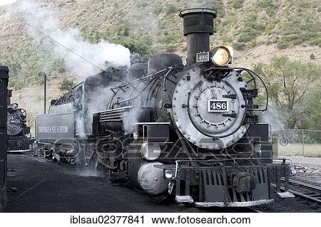 Stock Image - "Historic railway steam locomotive in the Durango and Silverton Narrow Gauge Railroad, narrow gauge, Durango, Colorado, Western United States, United States of America, North America". Fotosearch