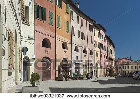 Stock Photo - "Historic row of houses with portico on the first floor, 15th century, Piazza Guglielmo Marconi, Brisighella, Emilia-Romagna, Italy, Europe". Fotosearch