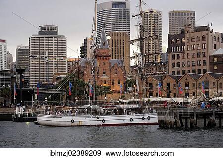 "Historic sailing ship entering Campbell's Cove, The Rocks, Sydney Harbour, Sydney, New South Wales, NSW, Australia, Oceania" View Large Photo Image Stock Photo - "Historic sailing ship entering Campbell's Cove, The Rocks, Sydney Harbour, Sydney, New South Wales, NSW, Australia, Oceania". Fotosearch