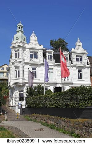 "Historic Strandhotel Blankenese, built in 1902, Strandweg street in Blankenese quarter, Hamburg-Blankenese, Altona district, suburb on the Elbe river, Hamburg, Germany, Europe, PublicGround, Europe" View Large Photo Image Stock Image - "Historic Strandhotel Blankenese, built in 1902, Strandweg street in Blankenese quarter, Hamburg-Blankenese, Altona district, suburb on the Elbe river, Hamburg, Germany, Europe, PublicGround, Europe". Fotosearch